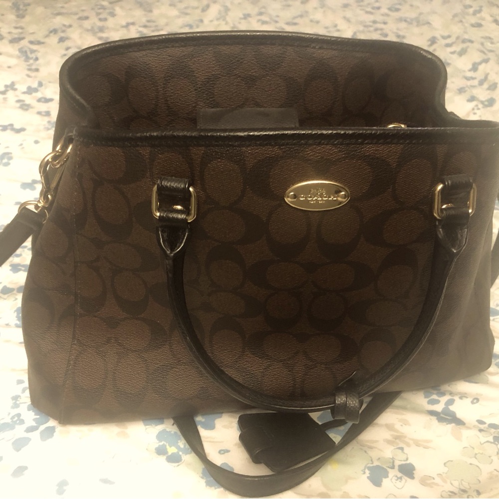 Coach monogram handbag. In excellent condition.